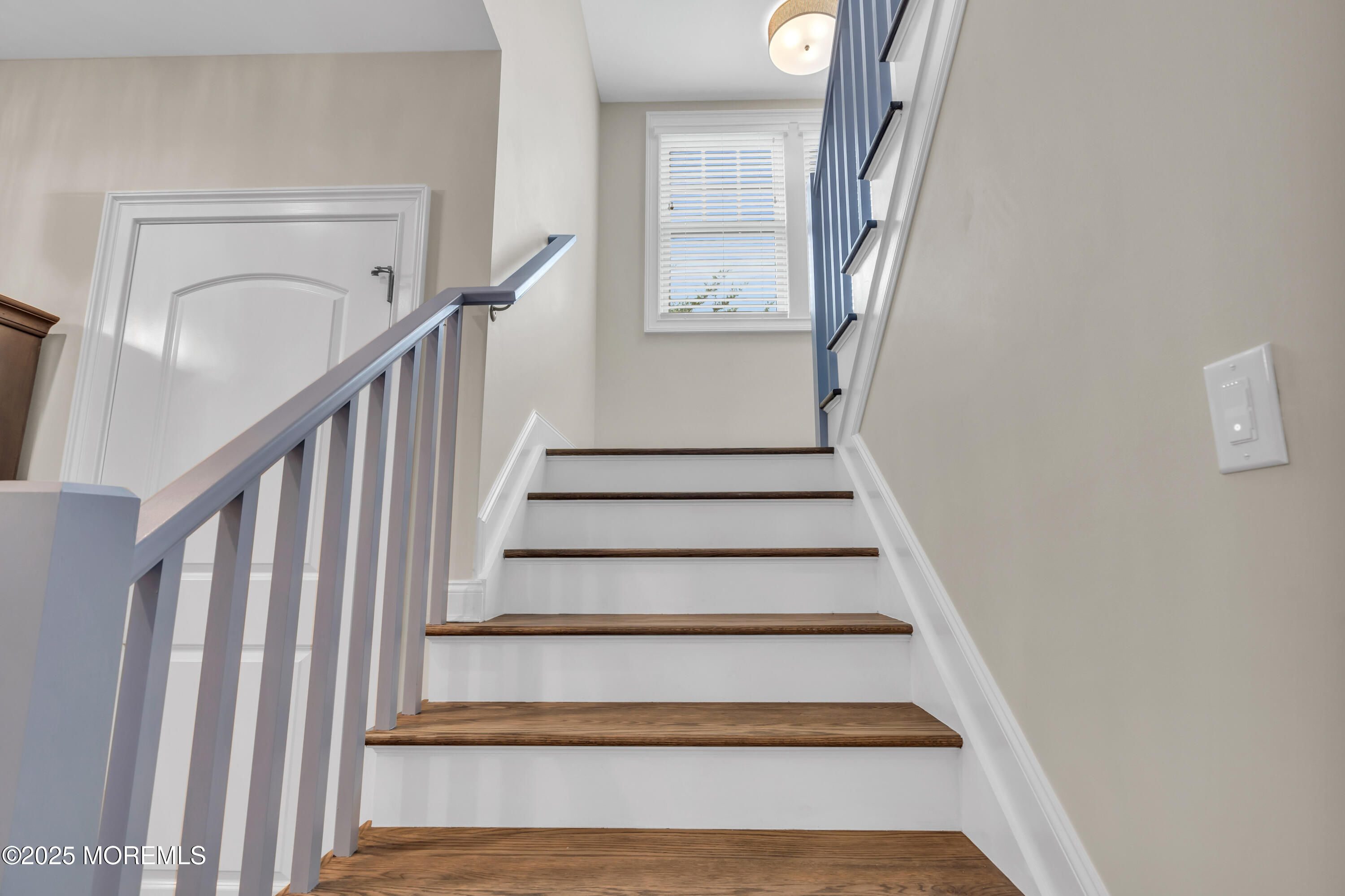 2118 Edgewood Place Spring Lake, NJ 07762 - Photo 29 of 67 a view of staircase with railing and white walls