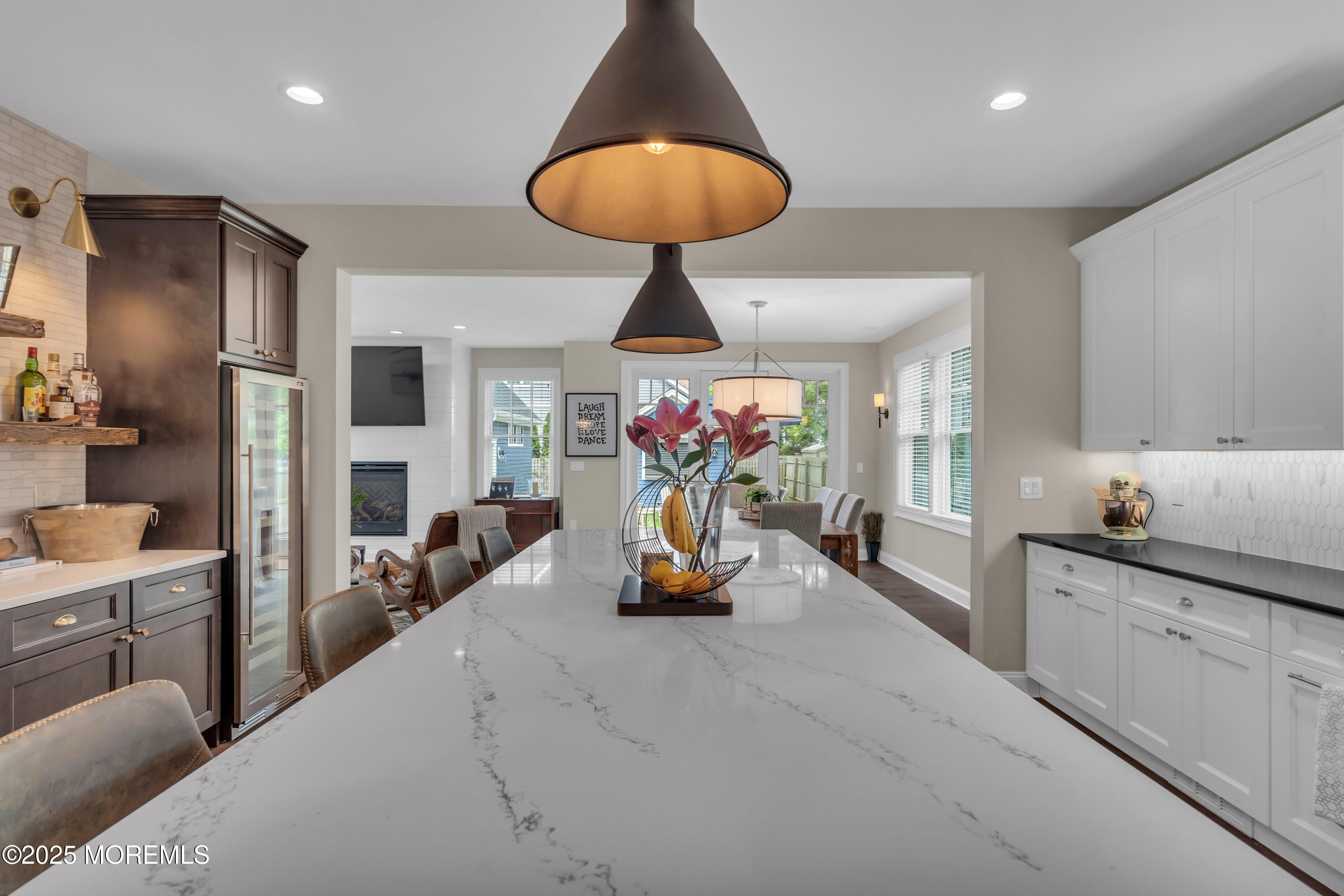 2118 Edgewood Place Spring Lake, NJ 07762 - Photo 38 of 67 a living room with furniture and a chandelier