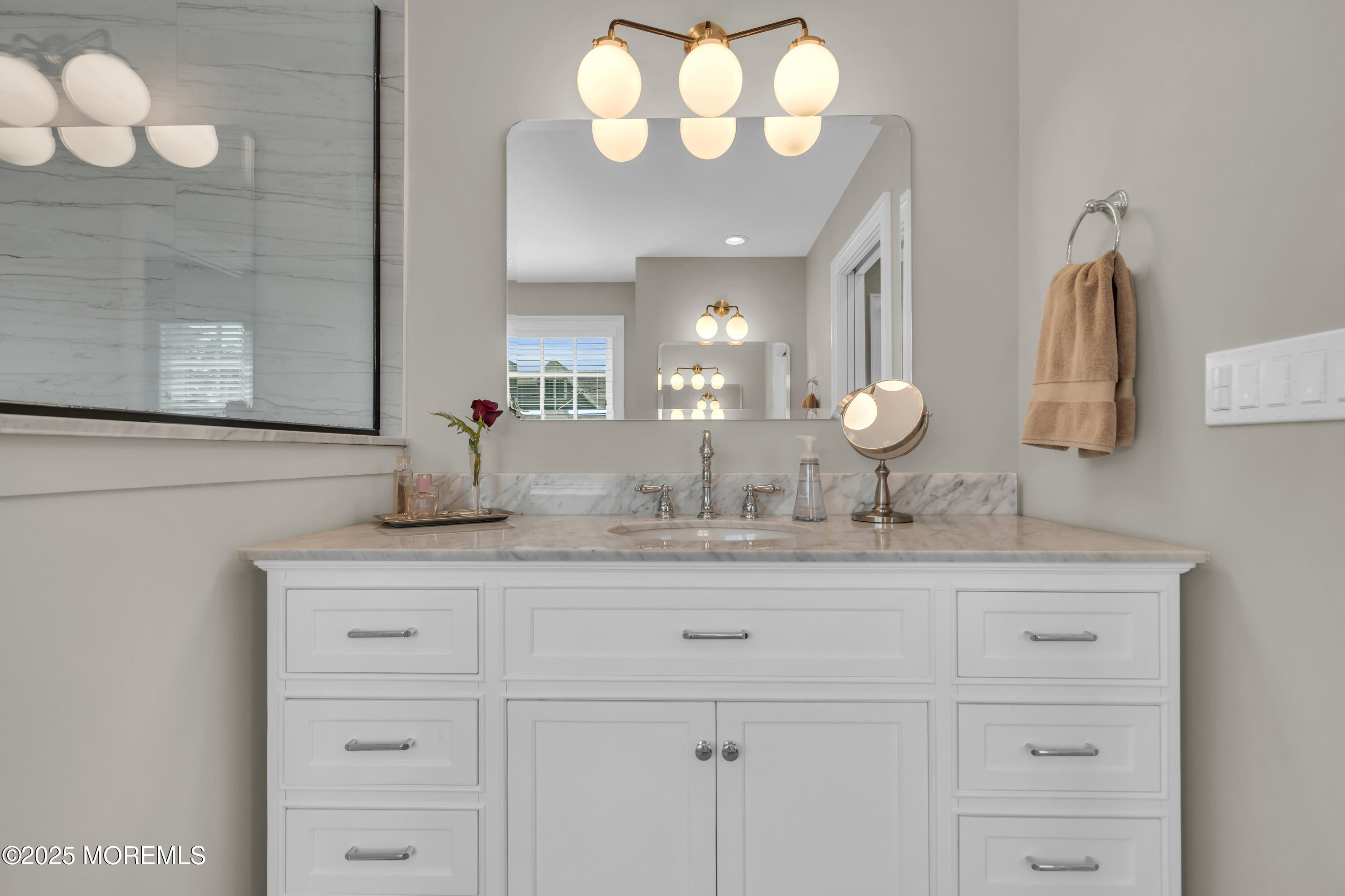 2118 Edgewood Place Spring Lake, NJ 07762 - Photo 56 of 67 a bathroom with a sink vanity and mirror