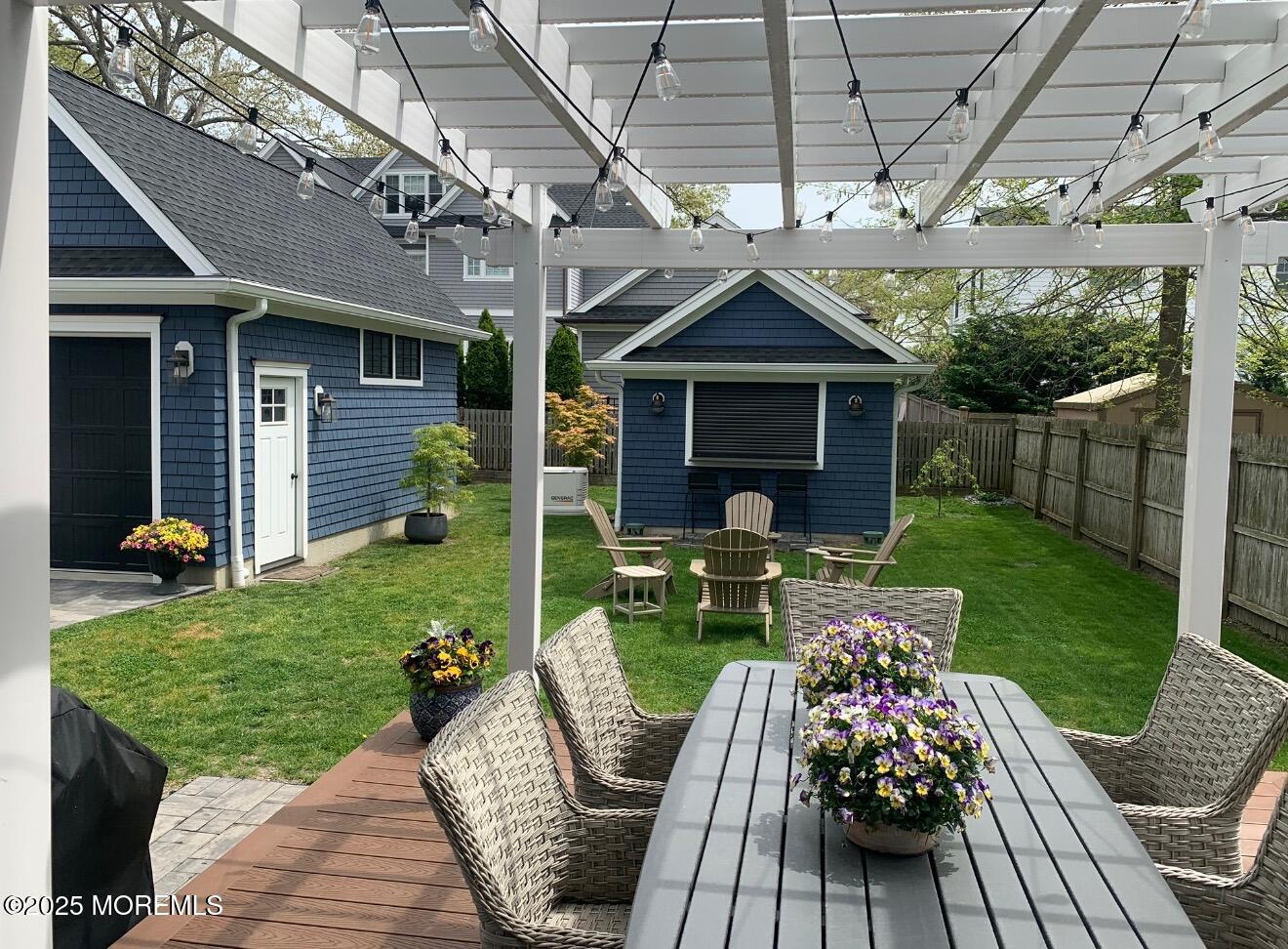 2118 Edgewood Place Spring Lake, NJ 07762 - Photo 7 of 67 a view of a house with backyard sitting area and garden