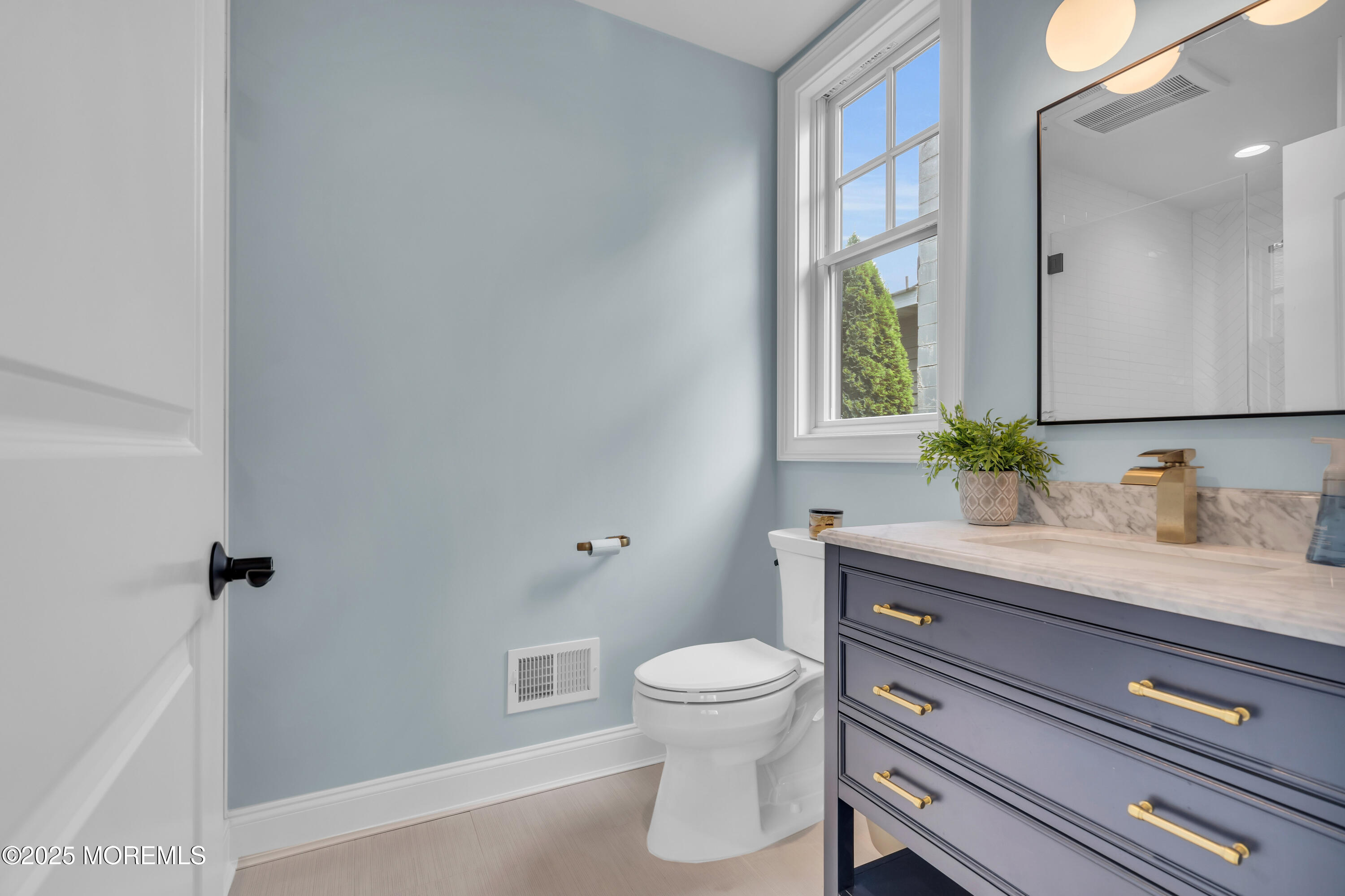 2118 Edgewood Place Spring Lake, NJ 07762 - Photo 10 of 67 a bathroom with a granite countertop toilet sink and mirror