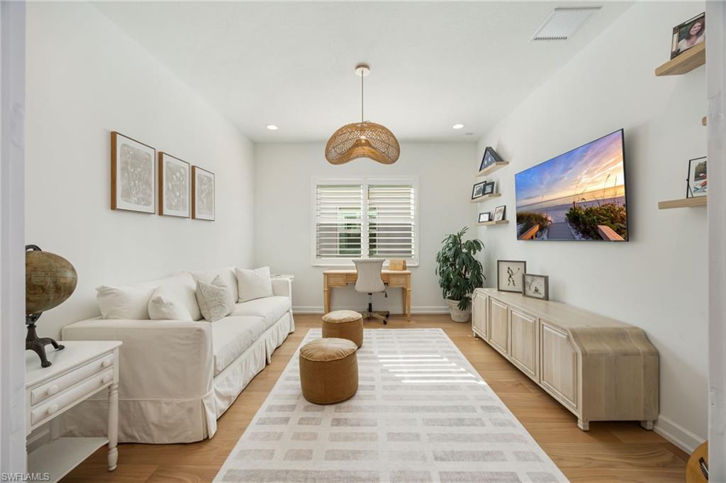 12128 Eucalyptus Way Naples, FL 34120 - Photo 15 of 47 The den is located just off of the foyer, with a double door-width entrance and wood flooring. This spot is perfectly tucked away to provide a place to work, watch a movie, or read a great book.