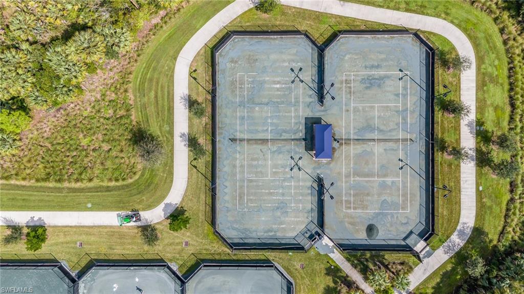 12128 Eucalyptus Way Naples, FL 34120 - Photo 32 of 47 Valencia Trails tennis courts.