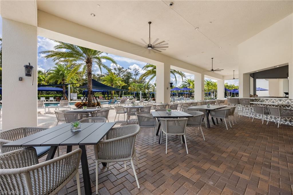 12128 Eucalyptus Way Naples, FL 34120 - Photo 39 of 47 Valencia Trails clubhouse patio