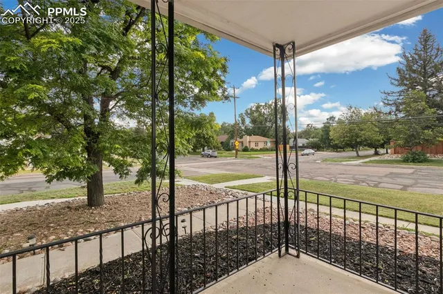 a view of a street from a balcony