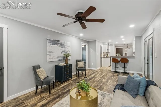 a living room with furniture and a window