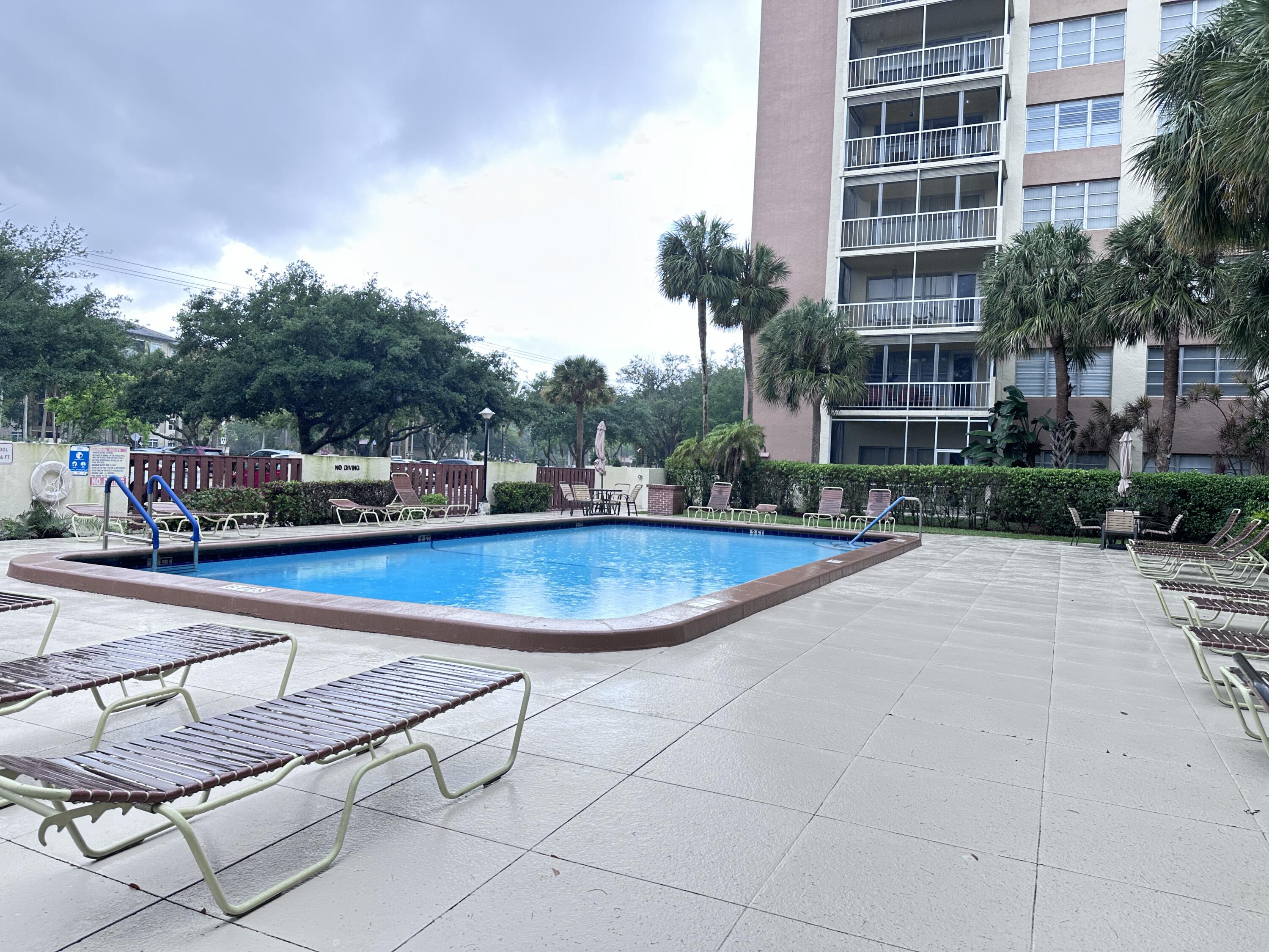 10777 West Sample Road, Unit 714 Coral Springs, FL 33065 - Photo 18 of 19 Pool 2