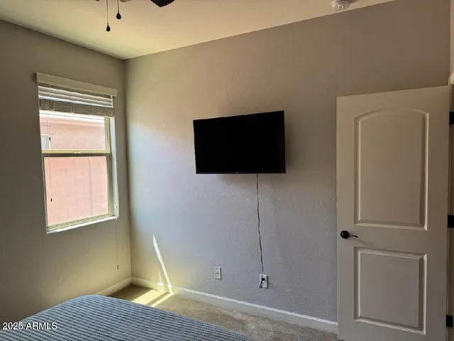 a bathroom with a double vanity sink and mirror