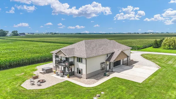 a view of a house with a big yard