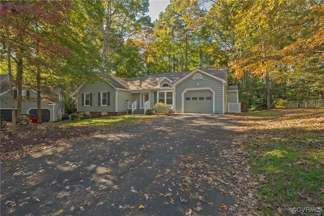 5812 Ridge Point Road Midlothian, VA 23112 - Photo 40 of 45 a front view of a house with a yard