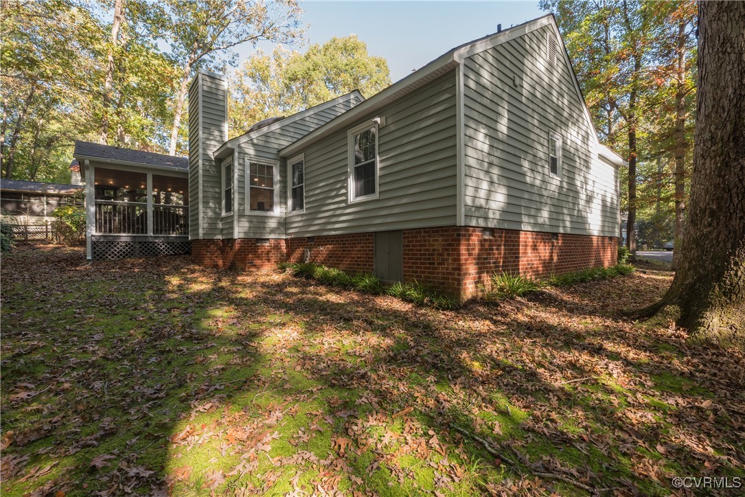 5812 Ridge Point Road Midlothian, VA 23112 - Photo 44 of 45 a front view of a house with a yard