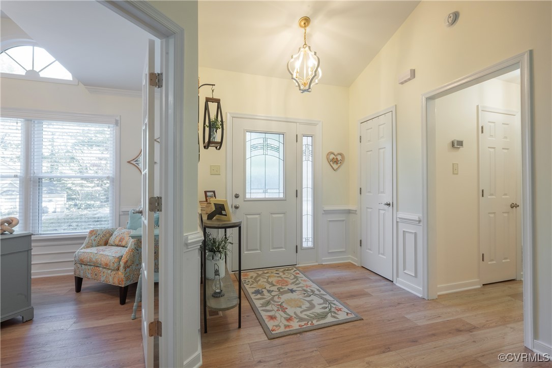 5812 Ridge Point Road Midlothian, VA 23112 - Photo 6 of 45 a spacious bedroom with a bed and wooden floor