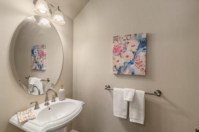 22 Myrtle Street Watertown, MA 02472 - Photo 11 of 18 a bathroom with a sink and a mirror