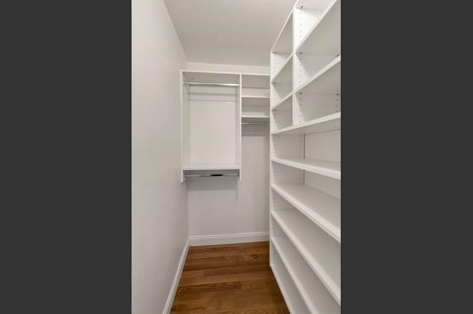 22 Myrtle Street Watertown, MA 02472 - Photo 15 of 18 a view of walk in closet with empty racks