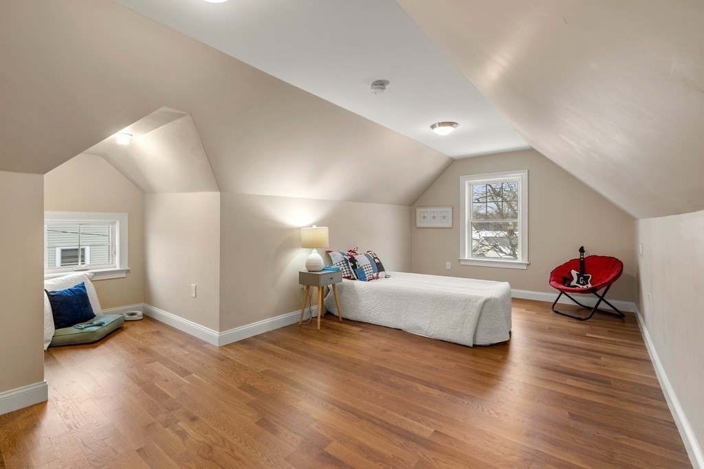 22 Myrtle Street Watertown, MA 02472 - Photo 18 of 18 a living room with furniture and a wooden floor