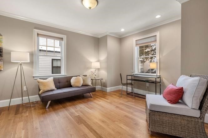 22 Myrtle Street Watertown, MA 02472 - Photo 8 of 18 a living room with furniture and a window