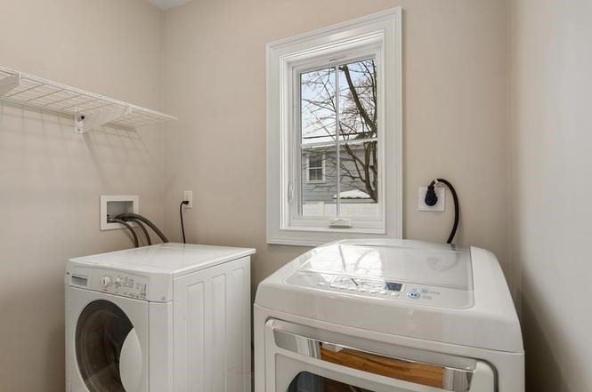 22 Myrtle Street Watertown, MA 02472 - Photo 10 of 18 a utility room with dryer and washer