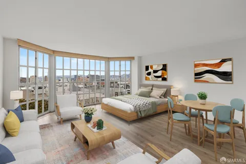 a living room with furniture and a floor to ceiling window