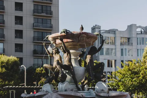a view of parking garage with cars