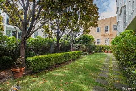 a backyard of a house with lots of green space