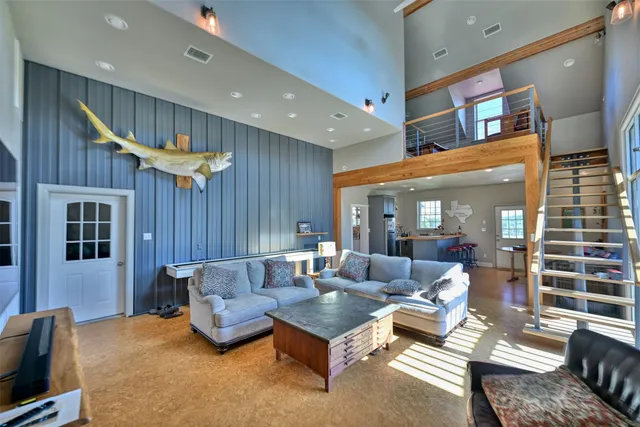 a room with furniture and air hockey table