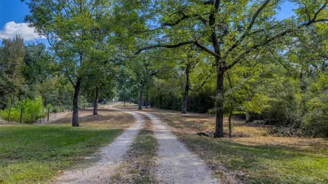 an aerial view of residential house with outdoor space