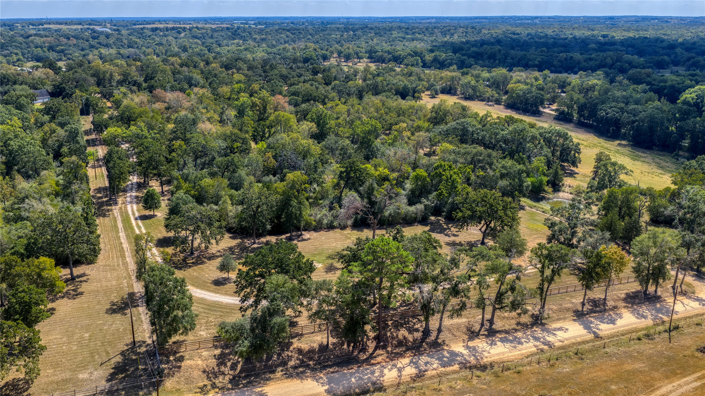 5960 Schoenau Road Brenham, TX 77833 - Photo 3 of 49 an aerial view of residential house with outdoor space