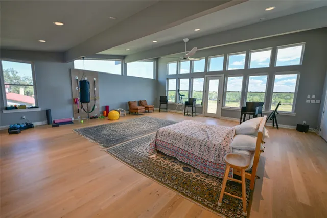 a living room with furniture and a wooden floors