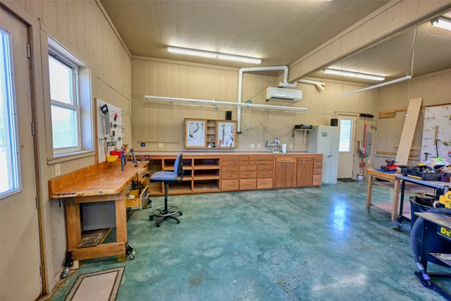 a play room with furniture and gym equipment