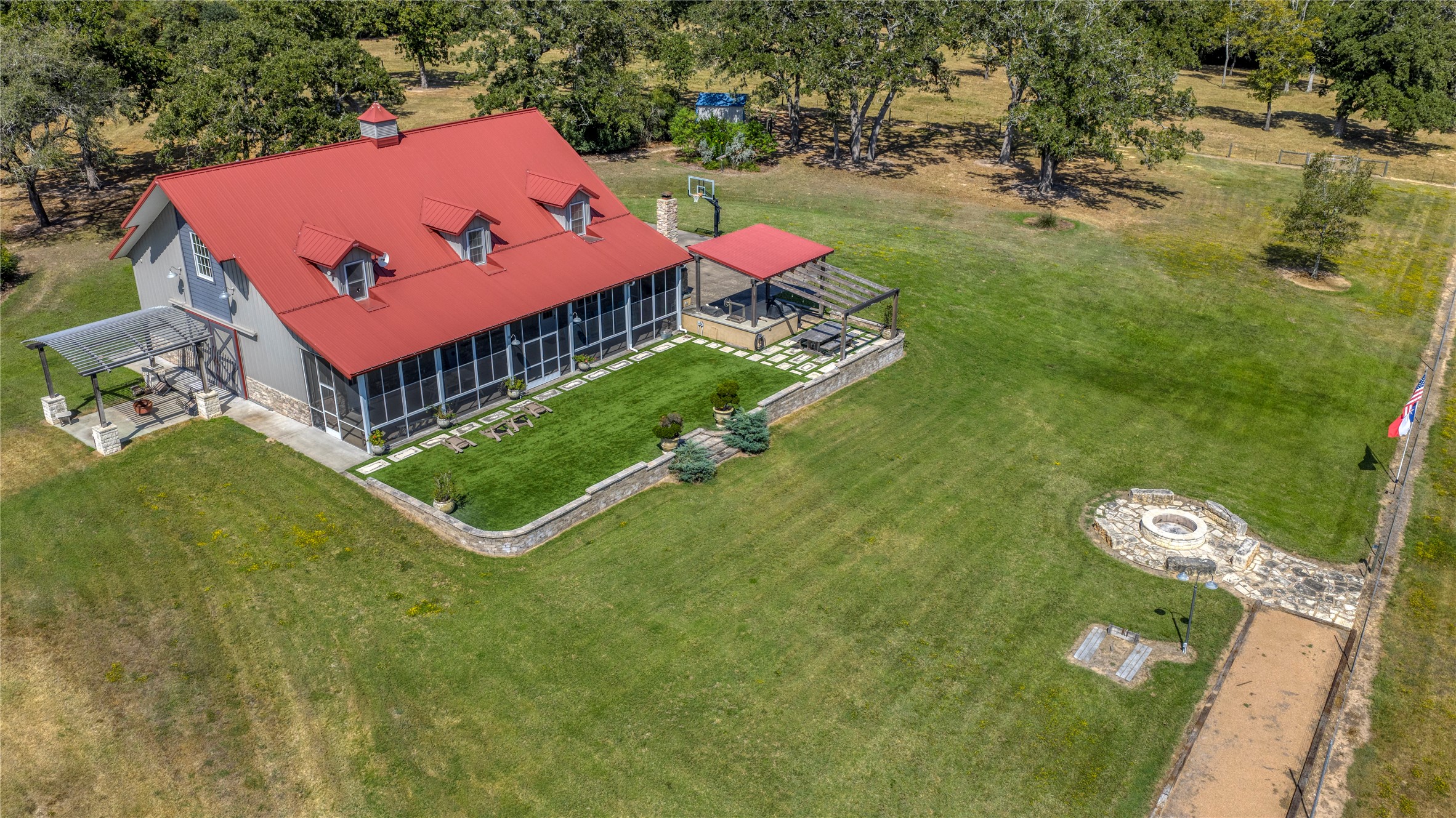 5960 Schoenau Road Brenham, TX 77833 - Photo 6 of 49 an aerial view of a house having yard