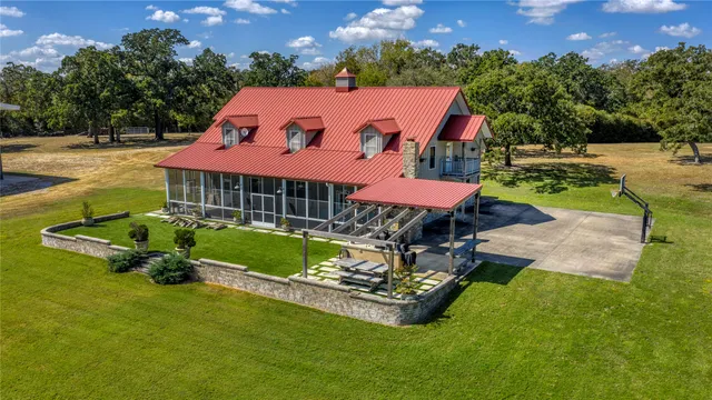 a view of two chairs in the balcony