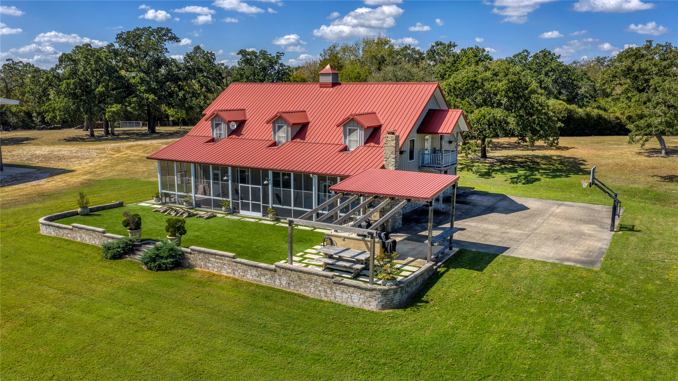5960 Schoenau Road Brenham, TX 77833 - Photo 7 of 49 an aerial view of a house with swimming pool garden and outdoor seating