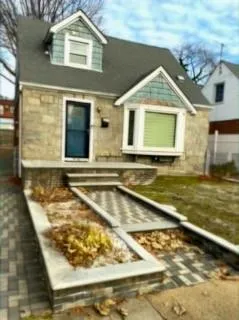 a view of swimming pool with a outdoor seating