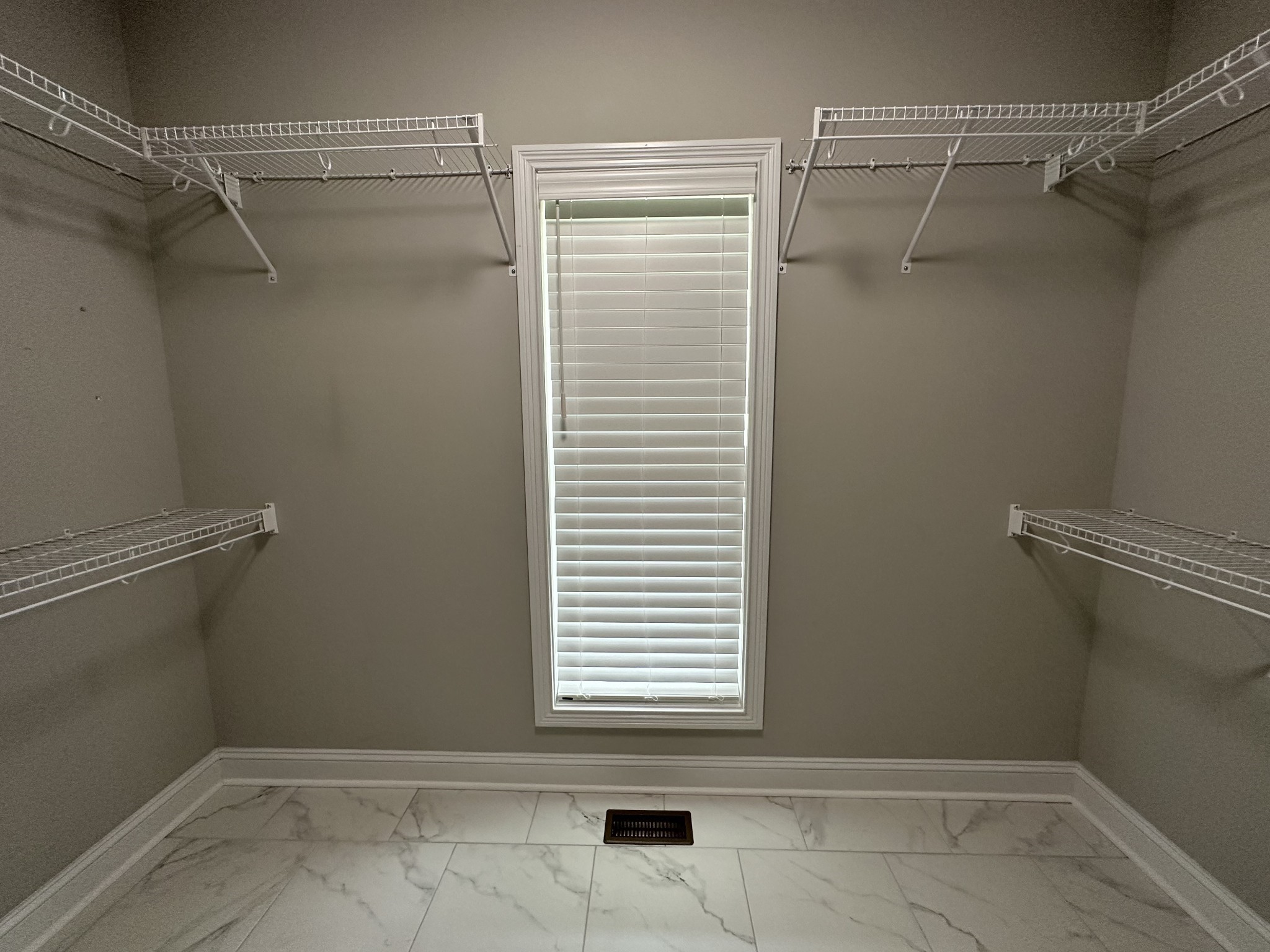 1592 Charles Bell Road Clarksville, TN 37043 - Photo 15 of 30 a view of a room with racks on the wall