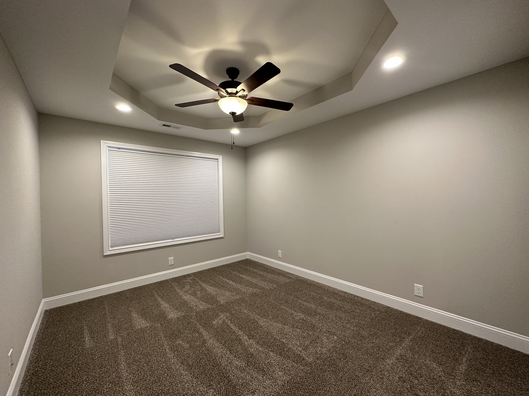 1592 Charles Bell Road Clarksville, TN 37043 - Photo 18 of 30 an empty room with a empty space and a ceiling fan