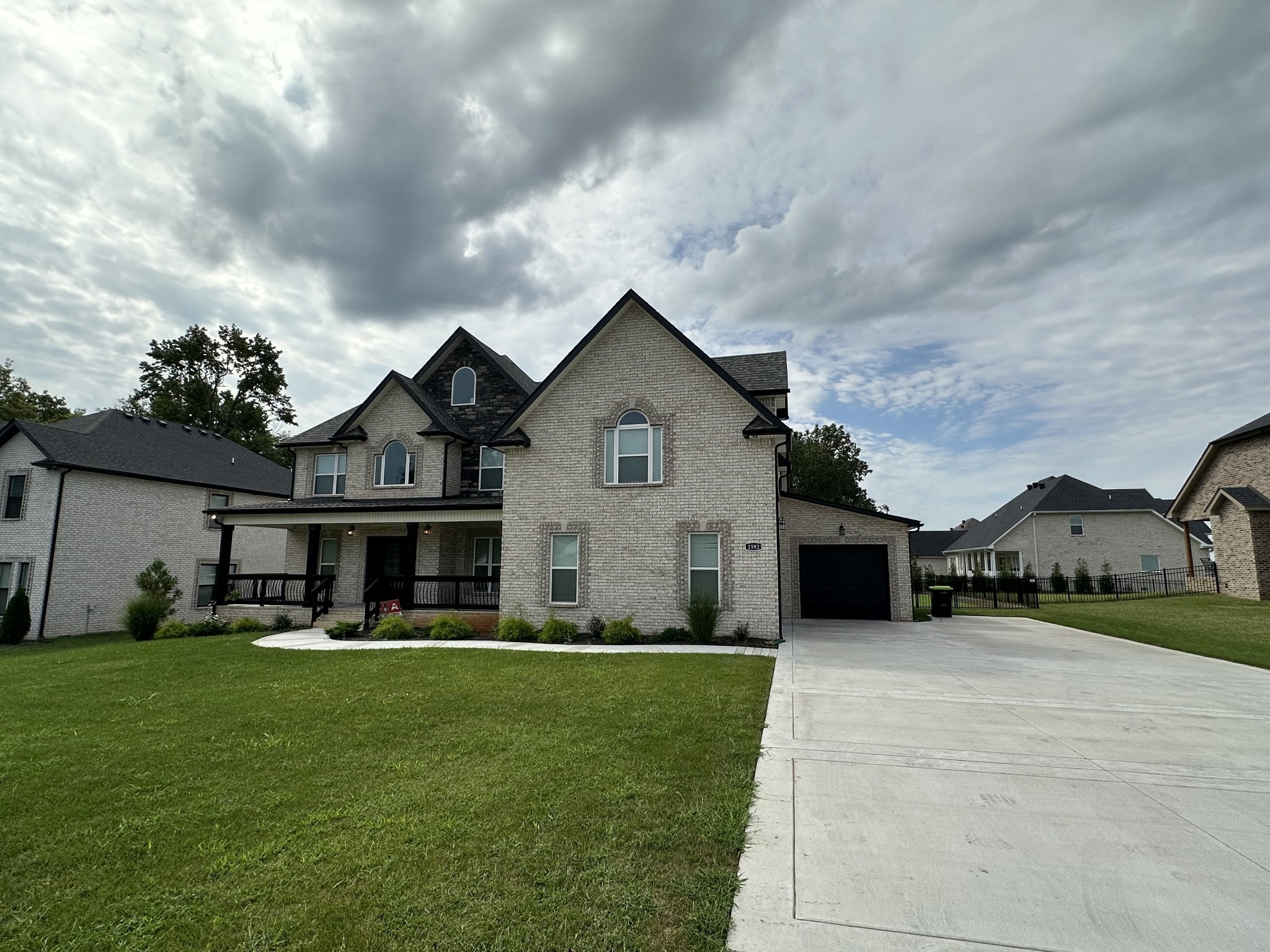 1592 Charles Bell Road Clarksville, TN 37043 - Photo 2 of 30 a front view of house with yard and green space