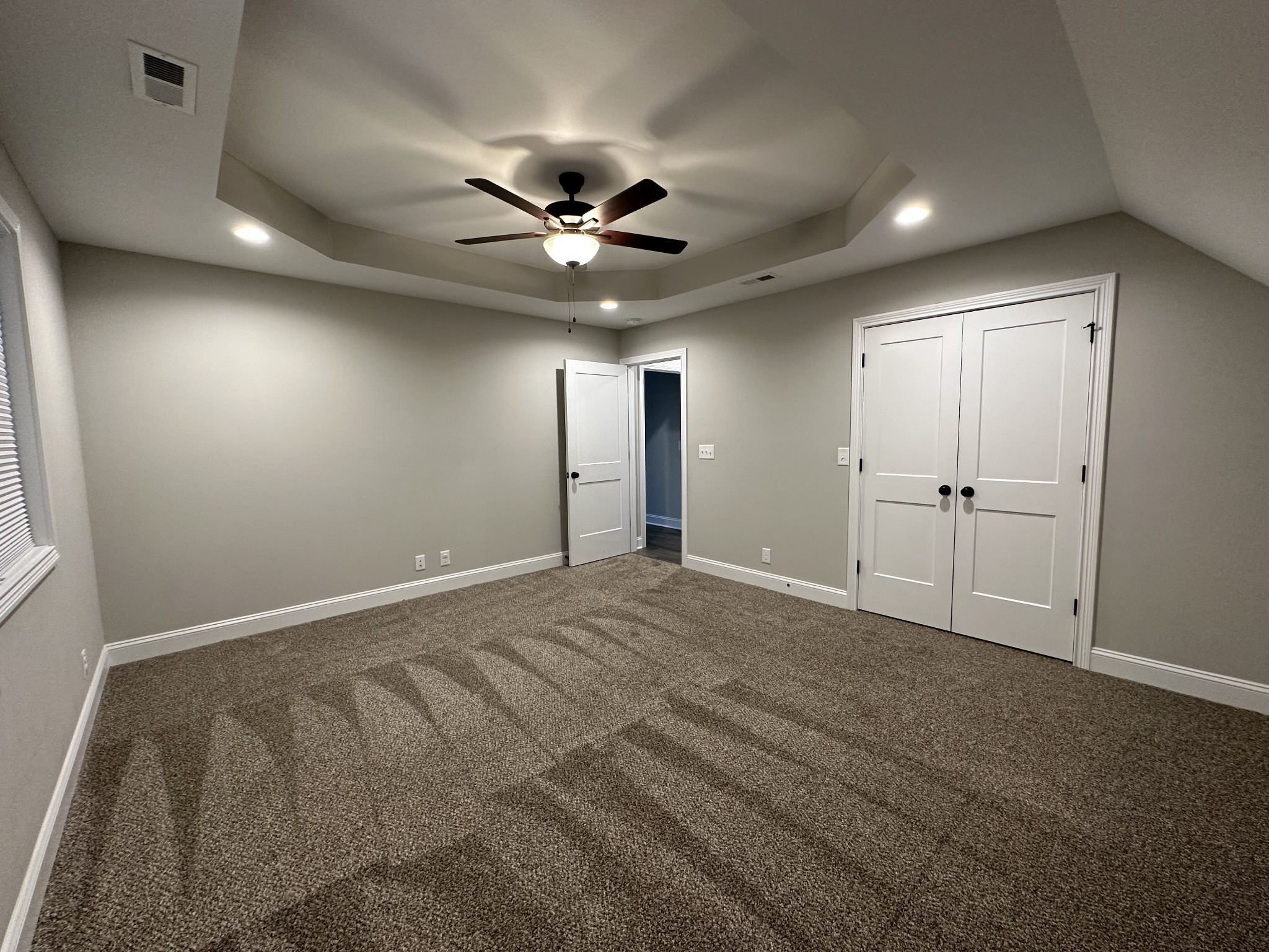 1592 Charles Bell Road Clarksville, TN 37043 - Photo 24 of 30 a view of an empty room with a ceiling fan