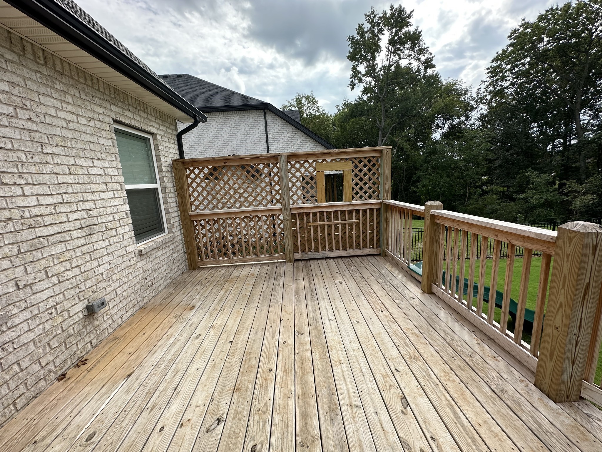 1592 Charles Bell Road Clarksville, TN 37043 - Photo 30 of 30 a view of a wooden deck with trees