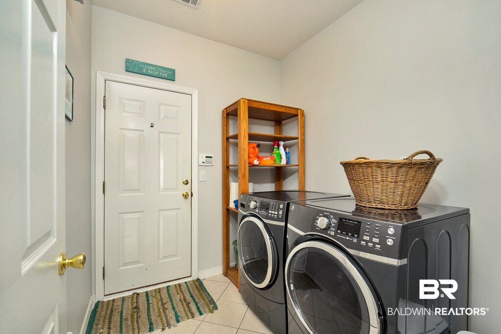 9546 Mosley Road Fairhope, AL 36532 - Photo 17 of 27 Inside Laundry Room