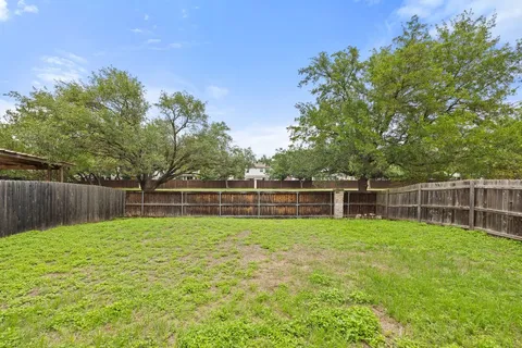 a view of a green yard