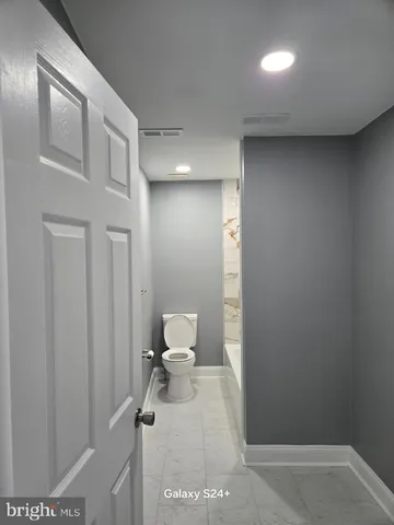 a bathroom with a toilet