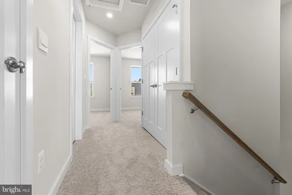 an empty room with closet area