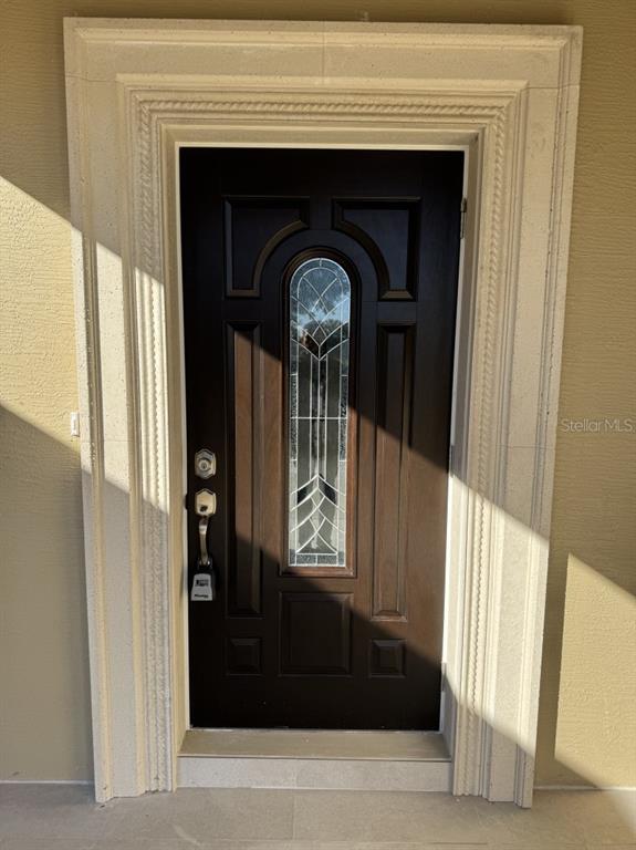 8351 Southwest 14th Lane Okeechobee, FL 34974 - Photo 14 of 46 a view of front door door of a house