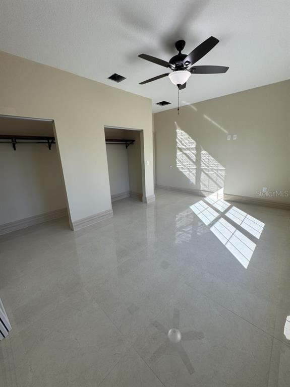 8351 Southwest 14th Lane Okeechobee, FL 34974 - Photo 39 of 46 a view of an empty room and a windows