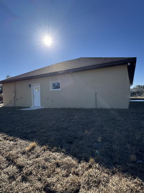 8351 Southwest 14th Lane Okeechobee, FL 34974 - Photo 6 of 46 a room with a wooden fence