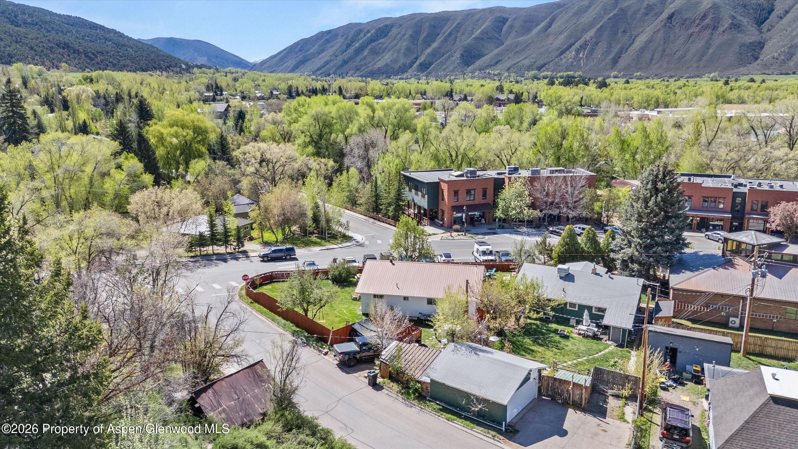262 Midland Avenue Basalt, CO 81621 - Photo 3 of 10 a view of a house with a yard and a table