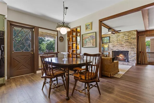 a kitchen that has a sink a counter space and stainless steel appliances