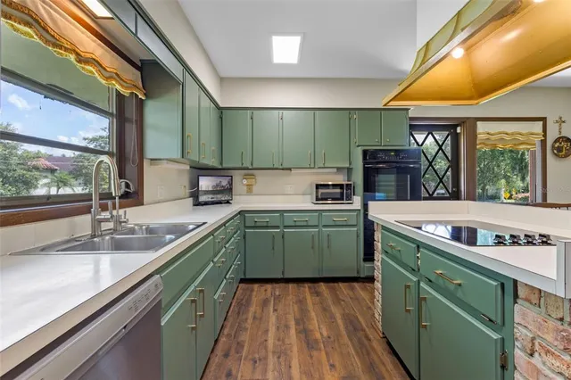 a spacious bathroom with a sink and a mirror