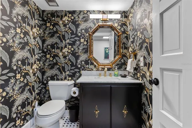 a view of a house with a swimming pool and a garden