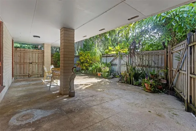 a view of house with a yard